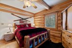 Cozy queen log bed